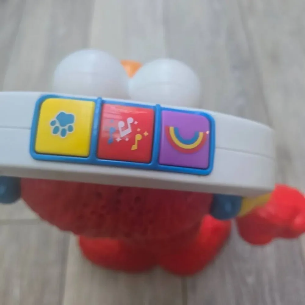 Sesame Street Let's Dance Elmo: 12-inch Elmo Toy Sings Sesame Street Toy for Kid